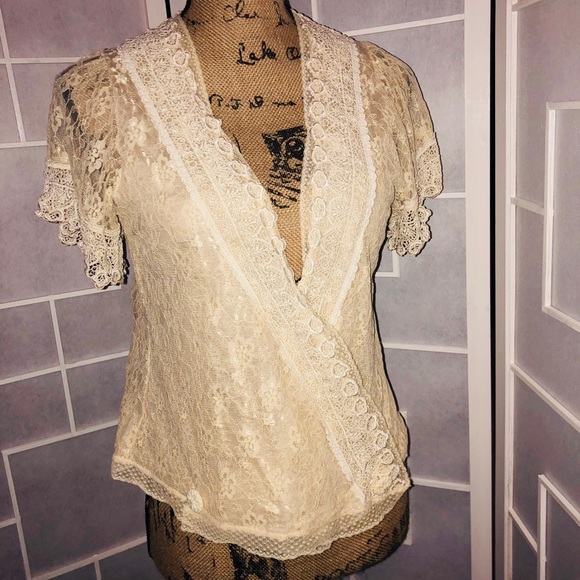 Super feminine lace wrap shirt. Hangs really well. - Picture 3 of 8